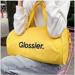 Glossier Vibrant Yellow Travel Bag